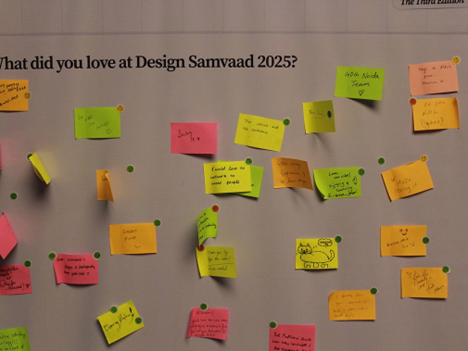 A feedback wall covered in sticky notes answering 'What did you love at Design Samvaad 2025?'